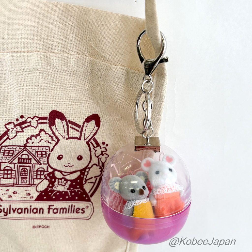 Llavero cápsula Estuche portátil para exhibición Morado