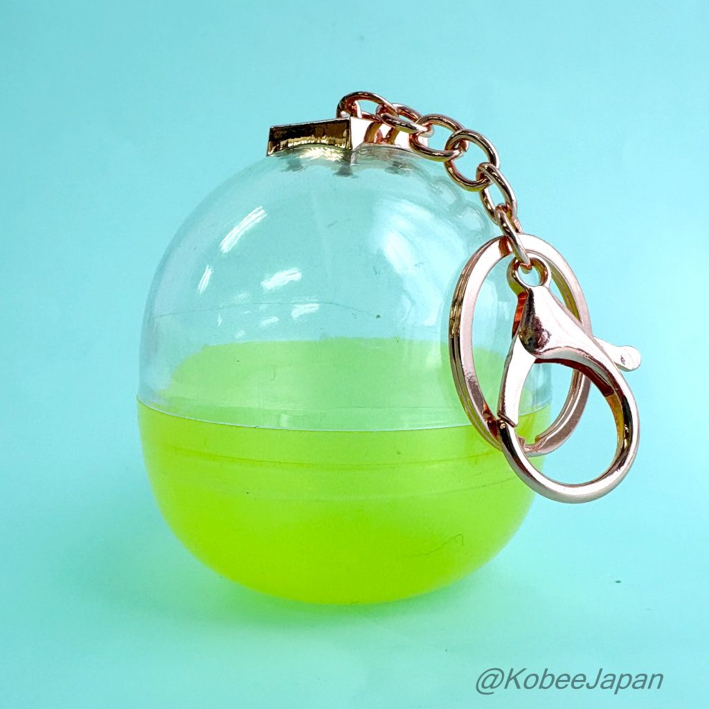 Llavero cápsula Estuche portátil para exhibición Amarillo