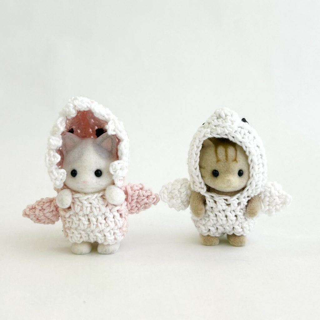 Disfraces hechos a mano de tiburón y foca tejidos a crochet