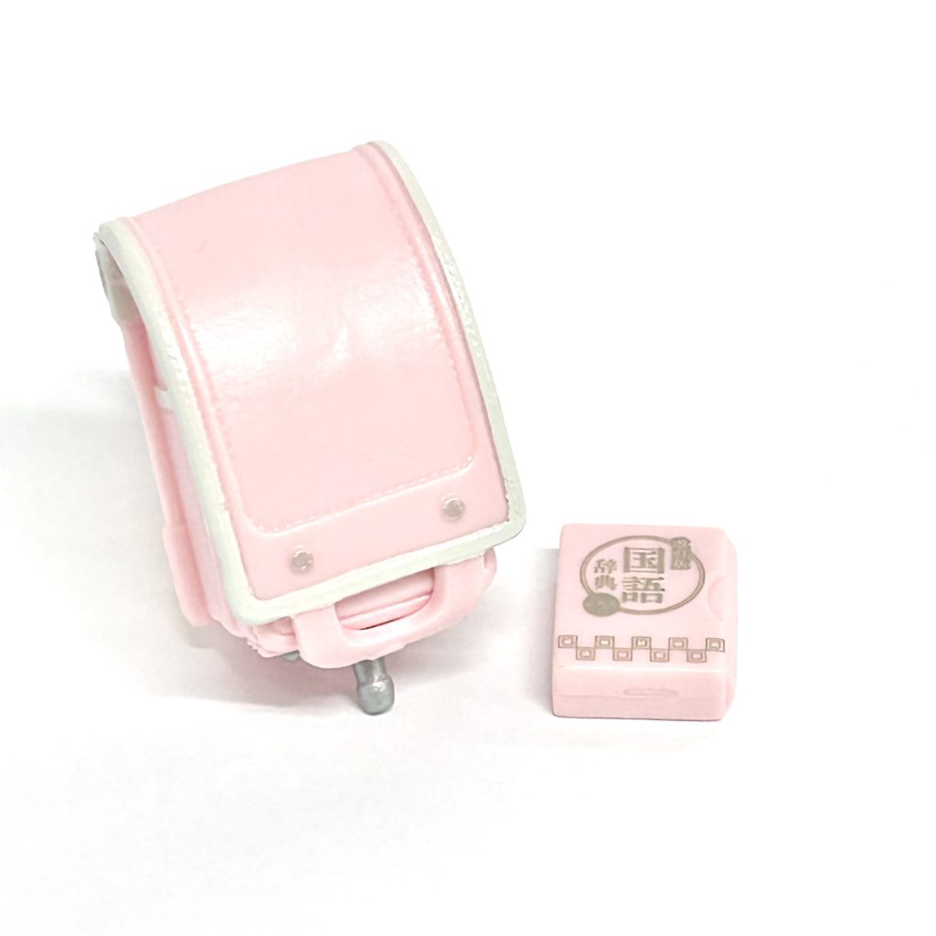 Mochila de juguete tipo cápsula y mochila escolar rosa tarlin