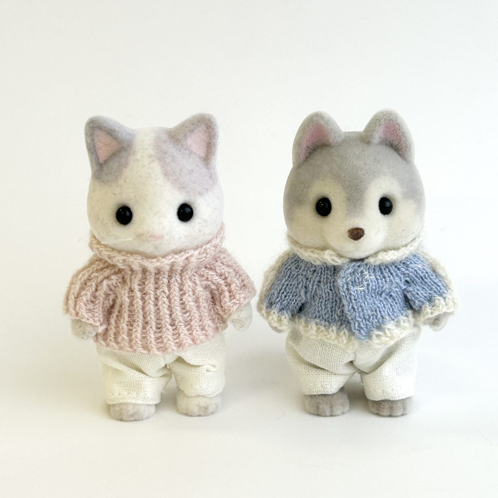 طقم سترة وسترة محبوكة يدوياً