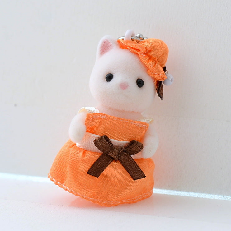 Llavero de gato de seda con vestido naranja época calico criaturas