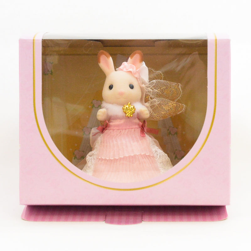 Conejo de chocolate encantador vestido rosa japón