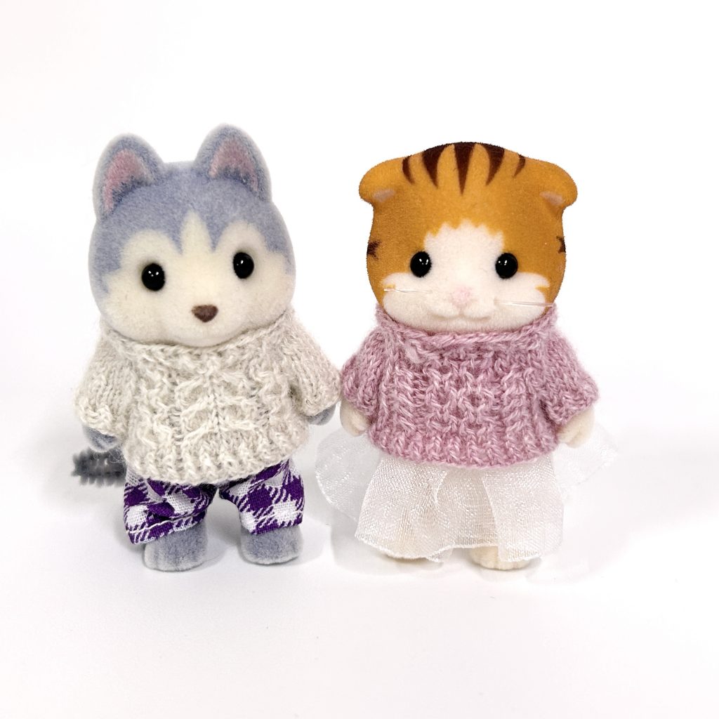 Pull en maille torsadée rose fait main