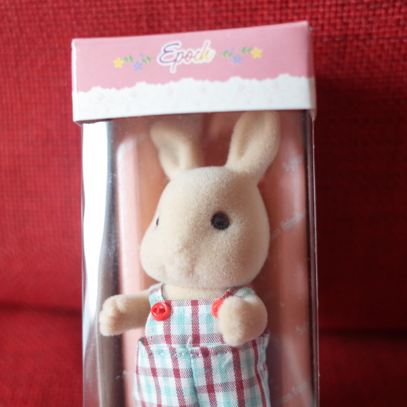 Vintage Ivory Rabbit Boy 1986 U-23 عائلات سيلفانيان كاليكو كريترز